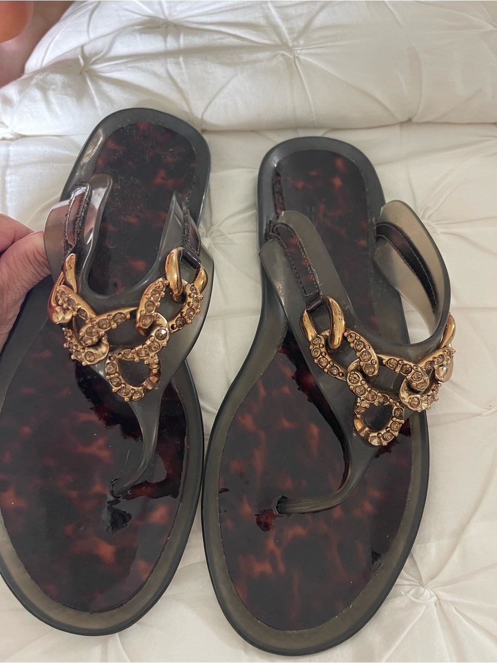 Stuart Weitzman Black Tortoiseshell Jelly Thong Sandals with Gold Chain Detail